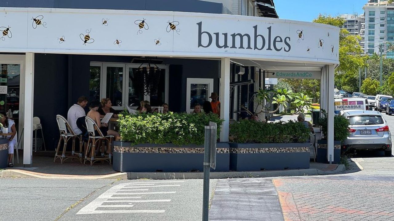 Front street view of Bumbles cafe with alfresco diners