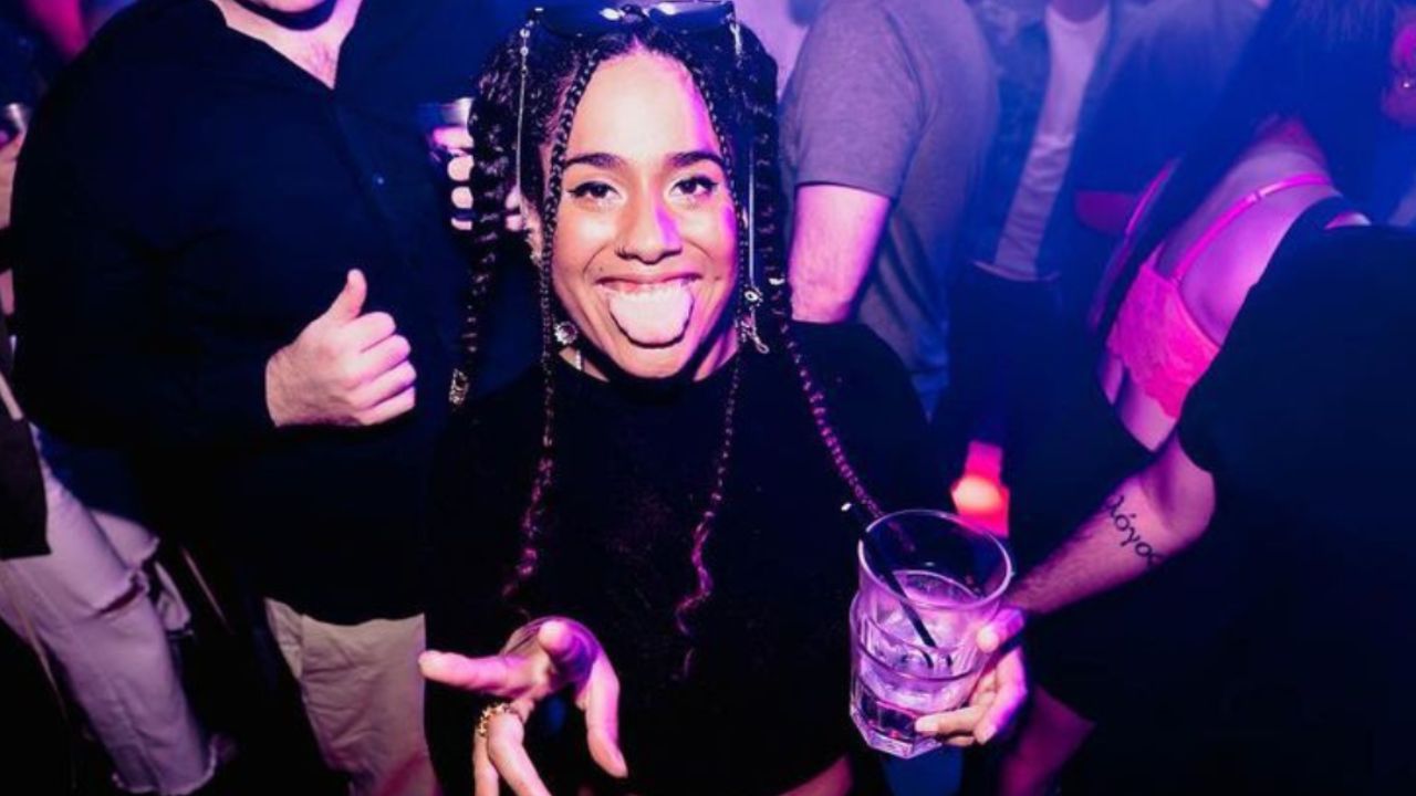 Happy backpacker enjoying the party nightlife at Mambo on the Gold Coast