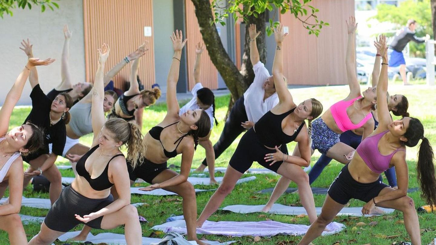 Budds hostel guests in a free yoga class